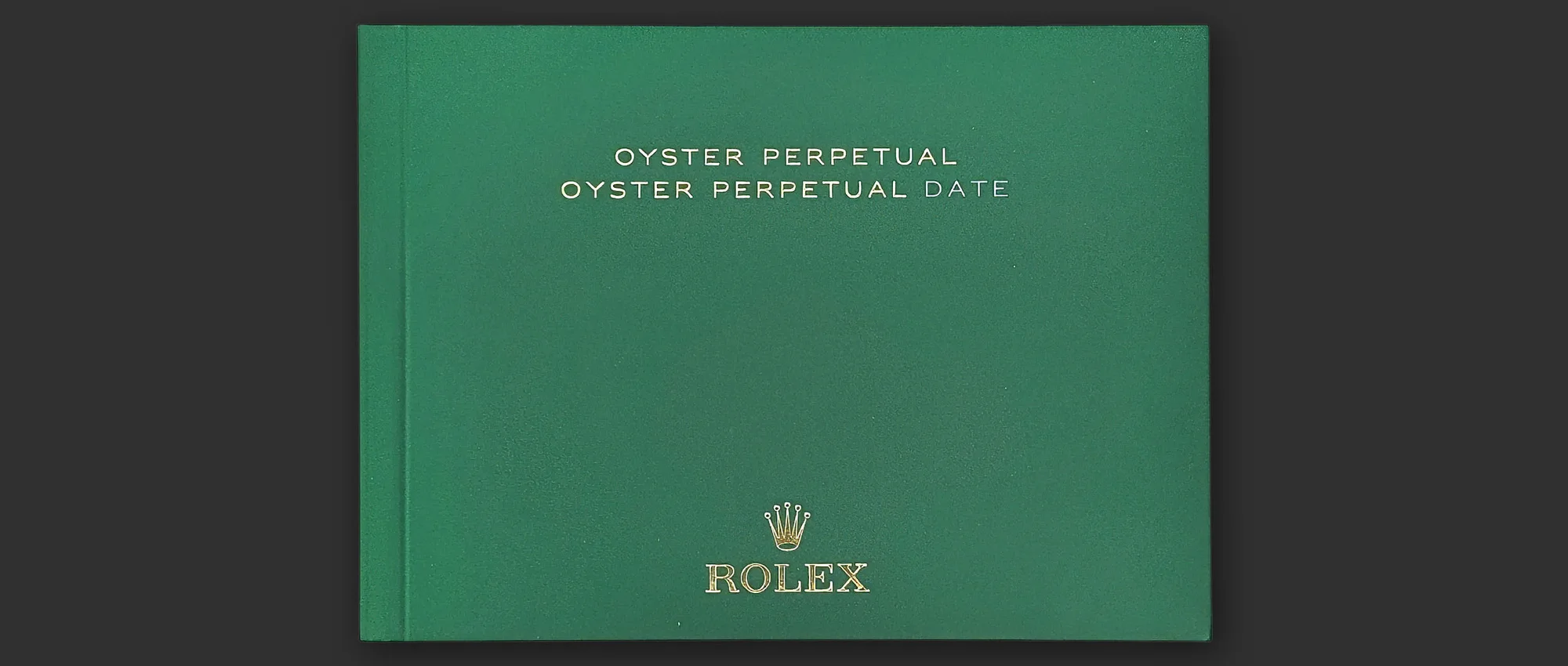 Green Rolex booklet "Oyster Perpetual, Oyster Perpetual Date" with gold embossing, front view